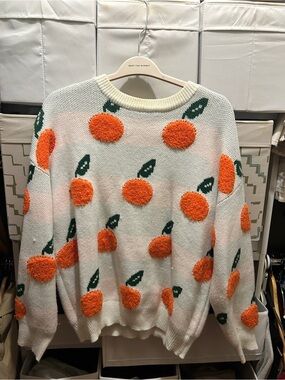 Cider Cream Crewneck Sweater with Orange Pom Fruit Motif